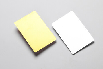 Blank Silver metal and gold business cards close up