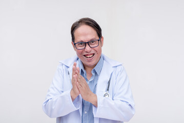 An evil, corrupt and mad doctor rubbing his hands together, relishing his money laundering scheme. A scam or quack doctor of asian descent, middle aged male. Isolated on a white background. - obrazy, fototapety, plakaty