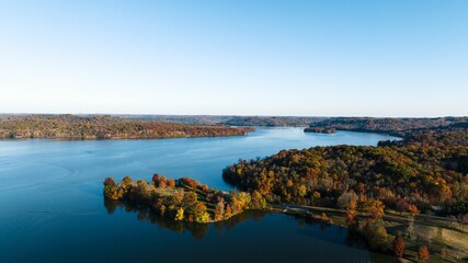 Picturesque scene of a serene lake in Ohio, with pristine blue water and lush foliage surrounding it