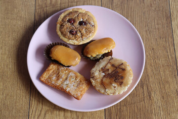 Dish with Asturian sweets such as carbayones or casadielles