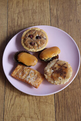 Dish with Asturian sweets such as carbayones or casadielles