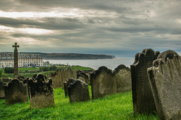 Graveyard in Whitby Seaside Town in North Yorkshire, England, UK on a stormy and rainy day