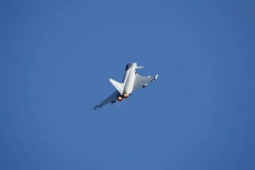 eurofighter typhoon  fighter jet  flying in the sky