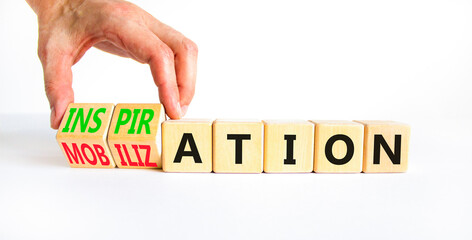 Inspiration or mobilization symbol. Concept words Inspiration and Mobilization on wooden cubes....