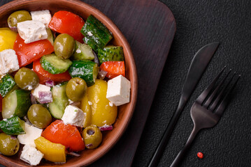 Delicious fresh, juicy Greek salad with feta cheese, olives, tomatoes, cucumber