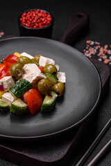 Delicious fresh, juicy Greek salad with feta cheese, olives, tomatoes, cucumber