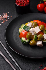 Delicious fresh, juicy Greek salad with feta cheese, olives, tomatoes, cucumber
