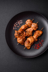 Delicious fresh, juicy chicken or pork kebab on skewers with salt and spices