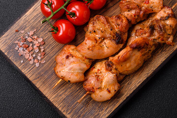 Delicious fresh, juicy chicken or pork kebab on skewers with salt and spices