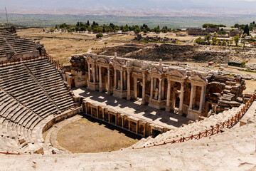 Old dilapidated architecture of Turkey. Ruins of an ancient city with huge amphitheater. Journey to...