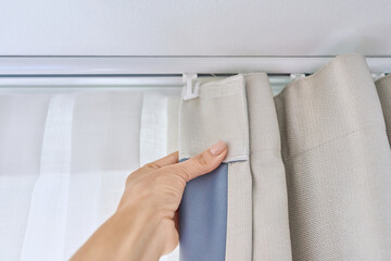 Ceiling cornice in two rows with curtains close-up © Valerii Honcharuk
