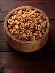 Crunchy Granola Snack on Wooden Boards. Copy Space