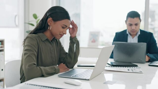 Working, headache and business woman with pain in office, workspace or Indian accounting employee with migraine. Tired, stress or accountant with burnout on audit or frustrated in corporate company
