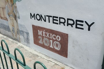 White wall with the text 'Montierry Mexico 2010'.