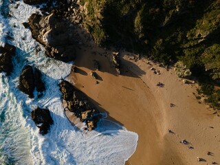 Top view of a sandy coast with rocks in Algarrobo, Valparaiso Region, Chile