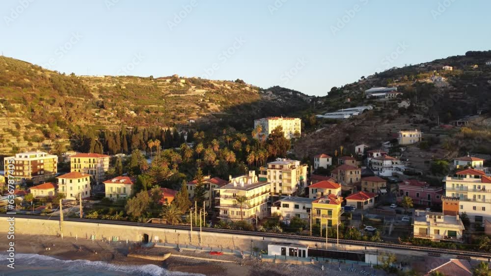 Sticker aerial footage of sunny puerto de bordighera coast houses by the sea in imperia, italy