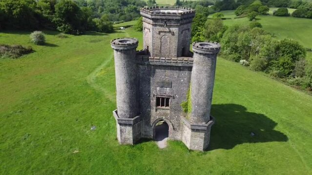 Aerial of the old Paxton's Tower in Wales in the green field