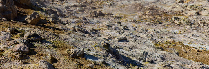 Hverir, Iceland. A surreal, bare orangy-red, geothermal area at the foot of Namafjall. Full of fumaroles, mud pools, steam vents. It's on Route 1. It is also called Namaskard Hverir.