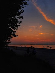 beautiful sunset on the beach in Rewa, Poland