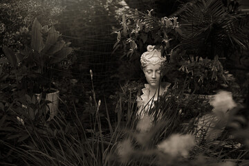 garden statue in the early morning