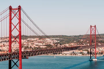 Fototapeten Aerial view of April 25th bridge crossing the Tagus river in Lisbon, Portugal. © PhotosbyPatrick