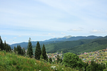 Fototapeta na wymiar Beautiful mountain landscape with village in Carpathians, Ukraine