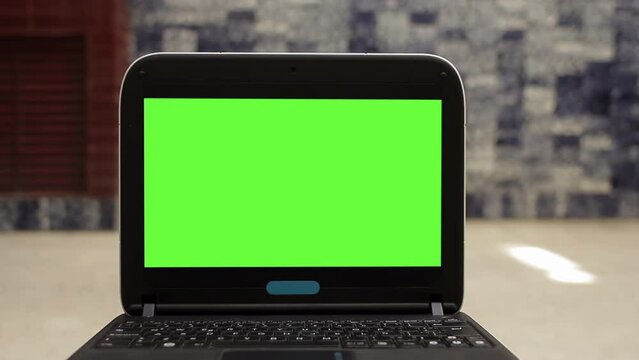Laptop Green Screen. Closeup. You can replace green screen with the footage or picture you want with “Keying” effect in After Effects (check out tutorials on YouTube). 4K.