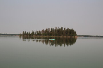 reflection of trees in the lake