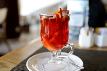 Wedang Uwuh, Traditional Warm Drink with Various Apice. Served on a Glass with Rock Sugar