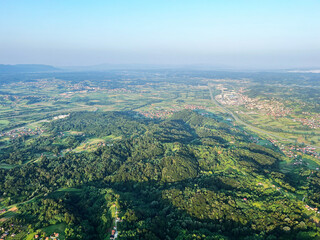 Fototapeta premium View of forests, fields, villages and Zagorje hills, during a panoramic balloon flight over Croatian Zagorje - Croatia (Panoramski let balonom iznad Hrvatskog zagorja - Hrvatska)