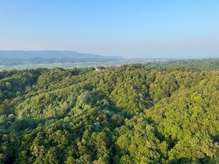 Fototapeta premium View of forests, fields, villages and Zagorje hills, during a panoramic balloon flight over Croatian Zagorje - Croatia (Panoramski let balonom iznad Hrvatskog zagorja - Hrvatska)