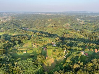 View of forests, fields, villages and Zagorje hills, during a panoramic balloon flight over Croatian Zagorje - Croatia (Panoramski let balonom iznad Hrvatskog zagorja - Hrvatska)