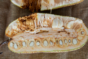 Ripe organic Chempedak fruit sliced to eat on table