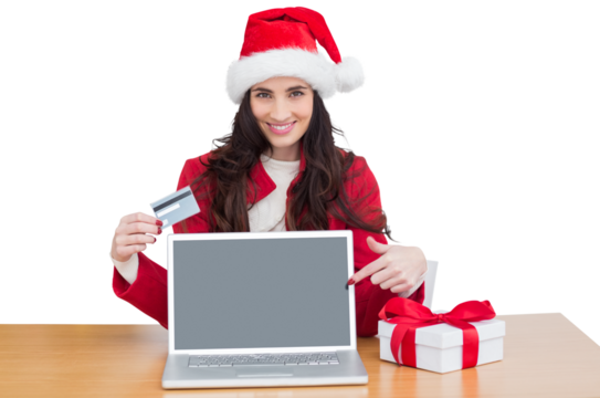 Digital png photo of happy caucasian woman in santa hat shopping online on transparent background