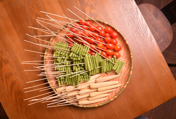 cold mixed raw meats, seafood, vegetable, mushroom, satay, beancurd, hot dog in stick for lok lok...