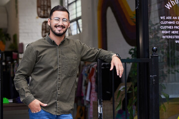 Happy, man or portrait in clothes store, fashion workshop or thrift shop in owner pride. Smile,...