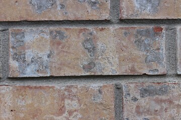 The wall is made of large bricks .Canada.