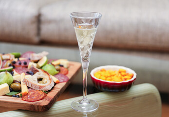 champagne and cup glass embodies celebration, luxury, and toasts, symbolizing joyous moments and achievements in elegant social gatherings