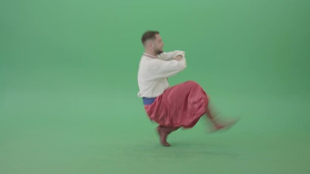 Ukraine dancing man dance cossack folk Hopak isolated on Green Screen
