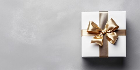 Fototapeta na wymiar White Gift Box with Gold Ribbon on White Background. Christmas Present