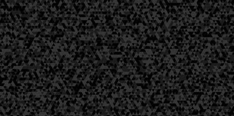Fototapeta premium Abstract seamless geometric triangle grid dark black background. Abstract geometric pattern gray and black Polygon Mosaic triangle Background, business and corporate background.