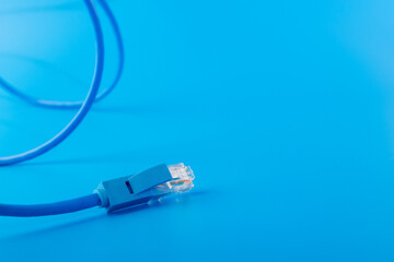 router cable, Patchcord, LAN cable for high speed internet, blue background