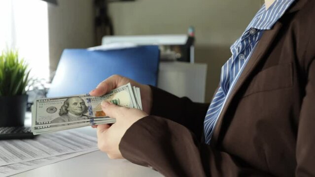 usd Exchange Rate, dollar up and down, increase and decrease in financial growth, woman counting cash dollars