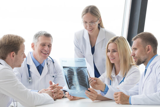 Team of expert doctors with x-ray