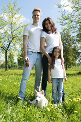 Obraz premium Cheerful family in park
