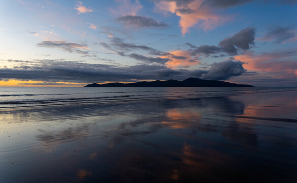 New Zealand, Paraparaumu, Sunset with afterglow at beach