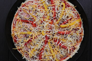 Pizza with peppers, anchovies and cheese