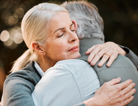 Old woman, face and senior couple hug, date and embrace with empathy, care and elderly marriage trust, love and support. Park, emotional connection and outdoor man, retirement wife or people hugging