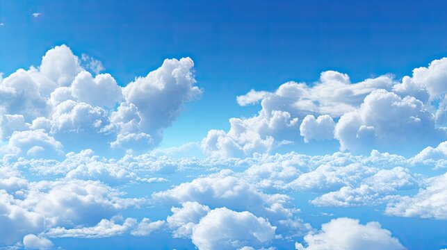 Image of white, fluffy clouds in blue sky