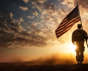 Tuinposter Soldier and USA flag on sunrise background . Veterans Day. © henjon